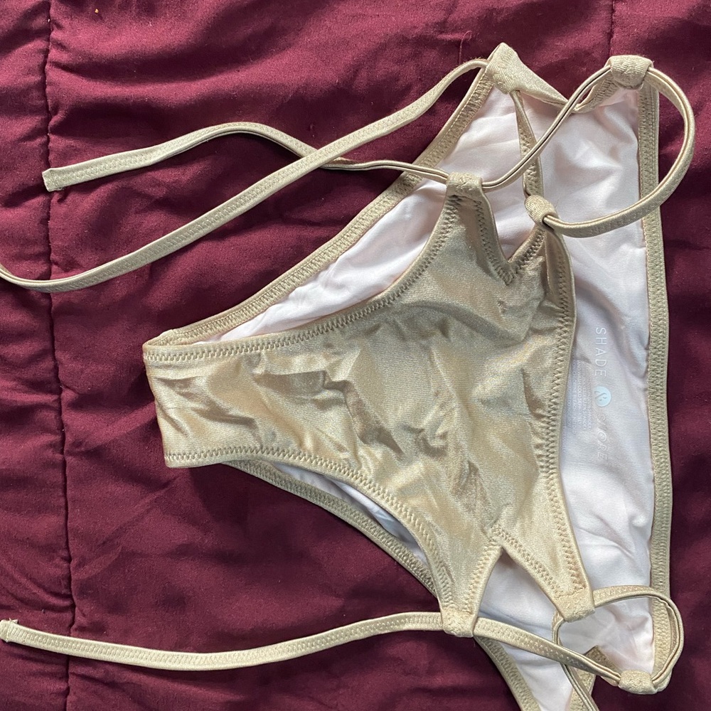 Tan color bikini bottom size small